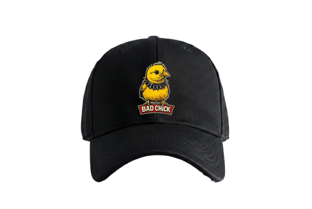 A yellow chick with a spiked collar stands on a red banner that reads BAD CHICK on a black t-shirt on PRDGY oversized t-shirt