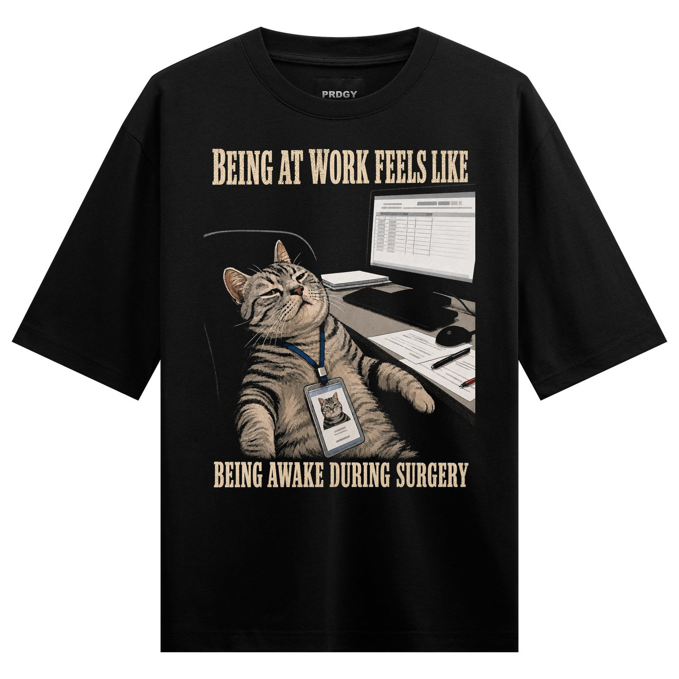 A tabby cat with closed eyes is slumped in an office chair in front of a computer wearing an ID badge with a cat photo on...