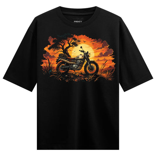 A detailed illustration of a vintage motorcycle under a silhouetted tree with birds flying against a vibrant orange and ye...