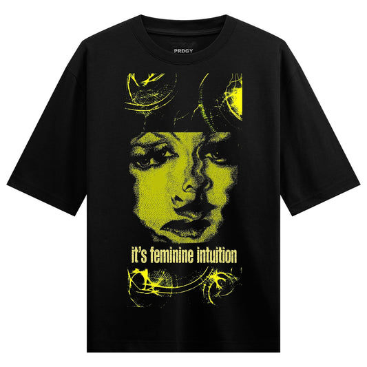 A black t-shirt features a distressed yellow portrait of a woman s face with abstract yellow swirls and text on PRDGY over...