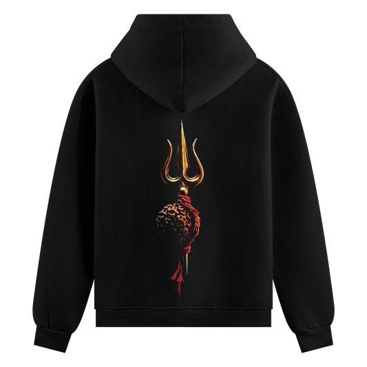Divine Trident Oversized Hoodie — a golden trident is positioned above a rudraksha bead, bound by a red cord