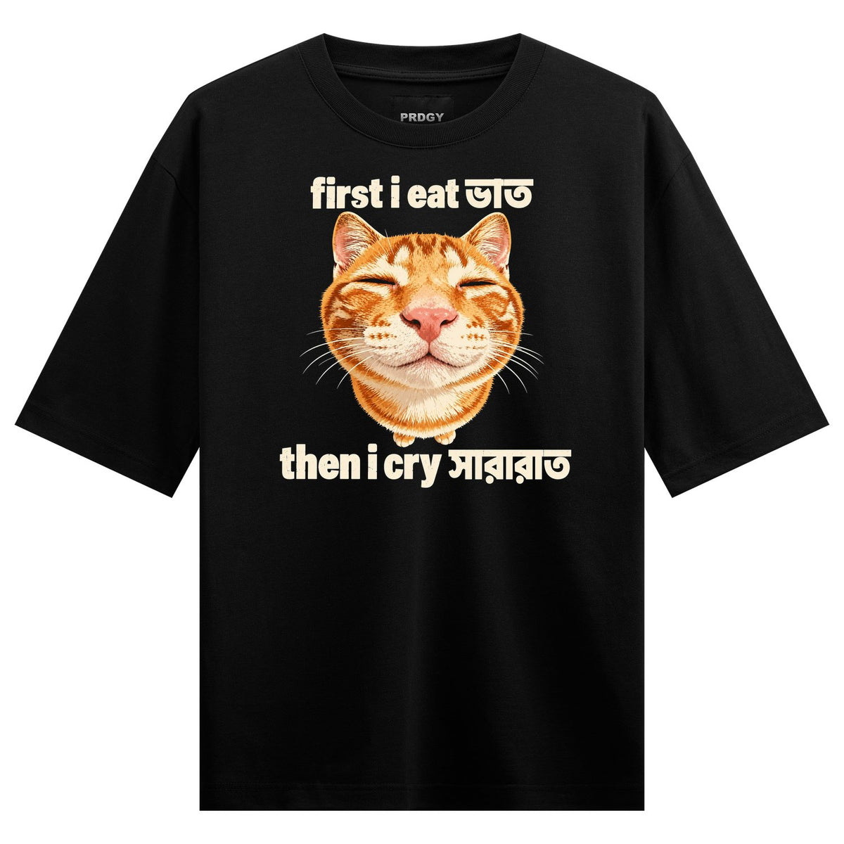 A photorealistic orange cat face with closed eyes surrounded by white text in English and Bengali script on a black tee on...