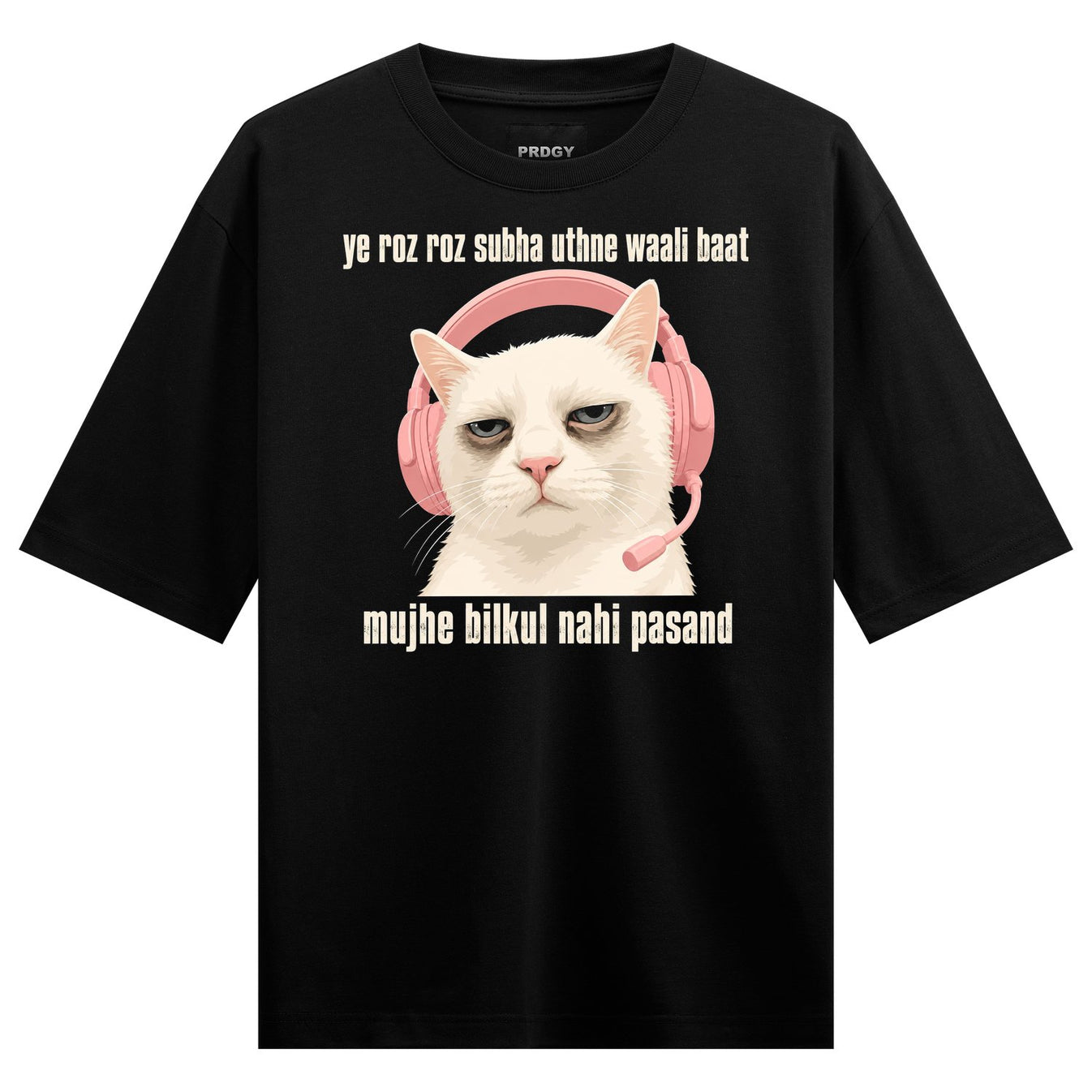 A white cat with a grumpy expression wears pink headphones with a microphone on a black t-shirt on PRDGY oversized full sl...