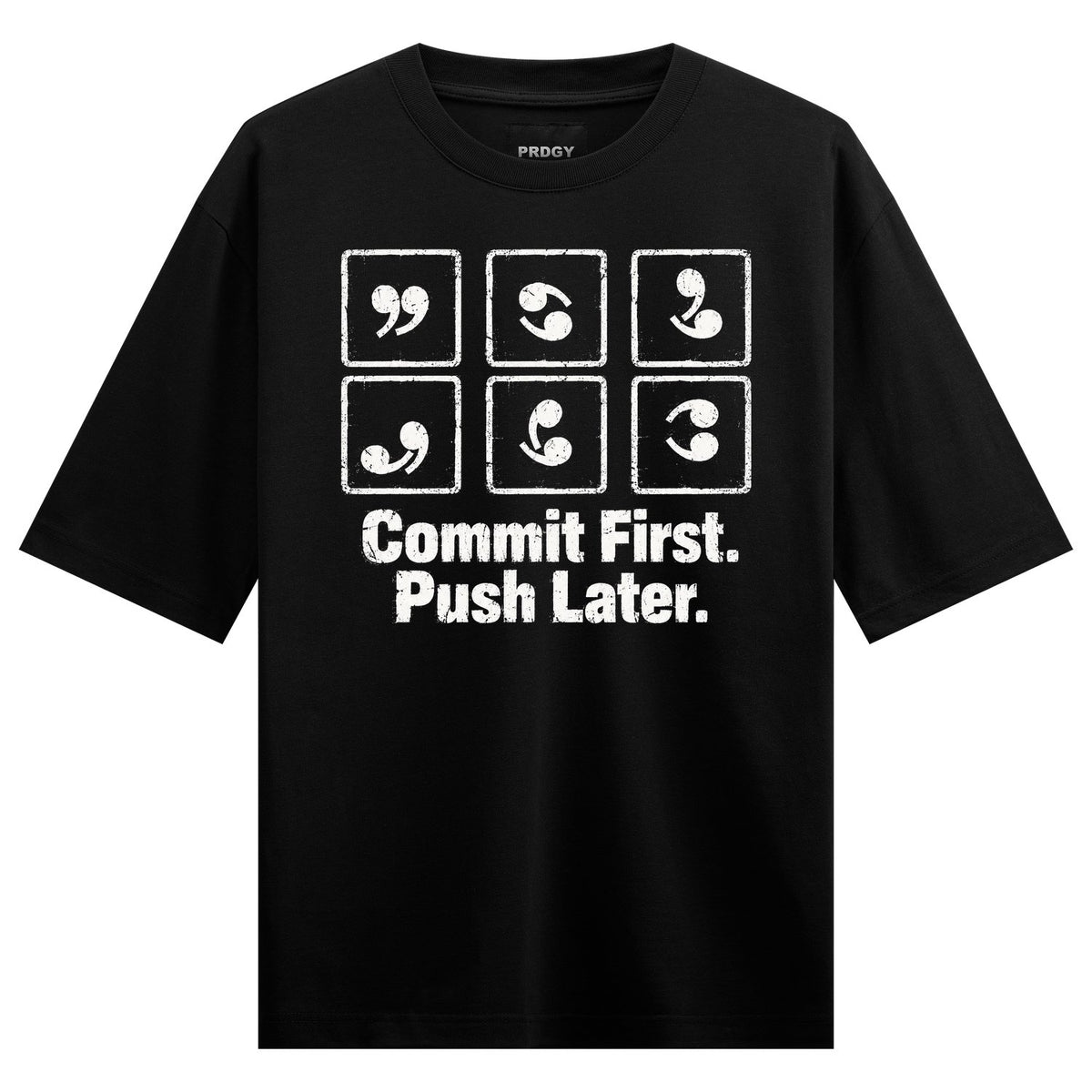 Commit Push Oversized T-Shirt — Black t-shirt with white distressed text and symbols in a grid layout
