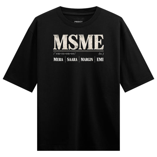 Black t-shirt with white distressed text spelling MSME with phonetic pronunciation and vertical bars separating words on P...