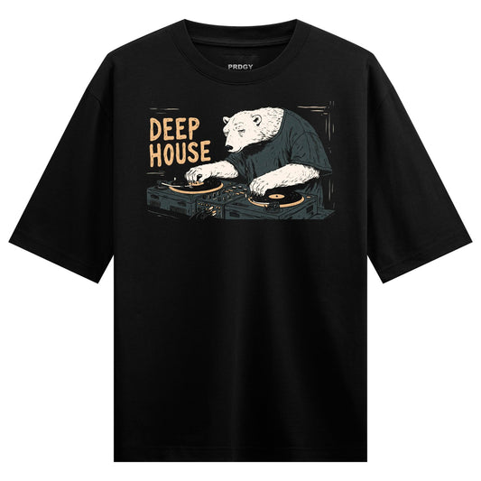 A black t-shirt features a graphic of a polar bear wearing a dark green t-shirt DJing on two turntables with yellow record...
