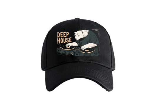 A black t-shirt features a graphic of a polar bear wearing a dark green t-shirt DJing on two turntables with yellow record...