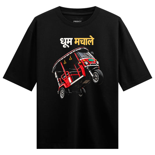 A red auto rickshaw graphic upside-down with yellow and white Hindi text on a black t-shirt on PRDGY oversized t-shirt