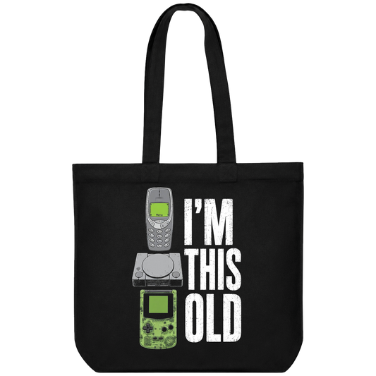Black t-shirt with stacked vintage Nokia phone Game Boy and white distressed text reading I M THIS OLD with green screen o...