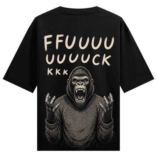 A distressed black t-shirt featuring a screaming gorilla in a sweater with raised hands and text above on PRDGY oversized...