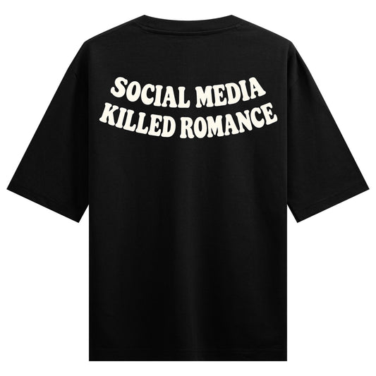 No media only Romance  Oversized T-Shirt — Black t-shirt with white bold arched text reading 'SOCIAL MEDIA KILLED ROMANCE'