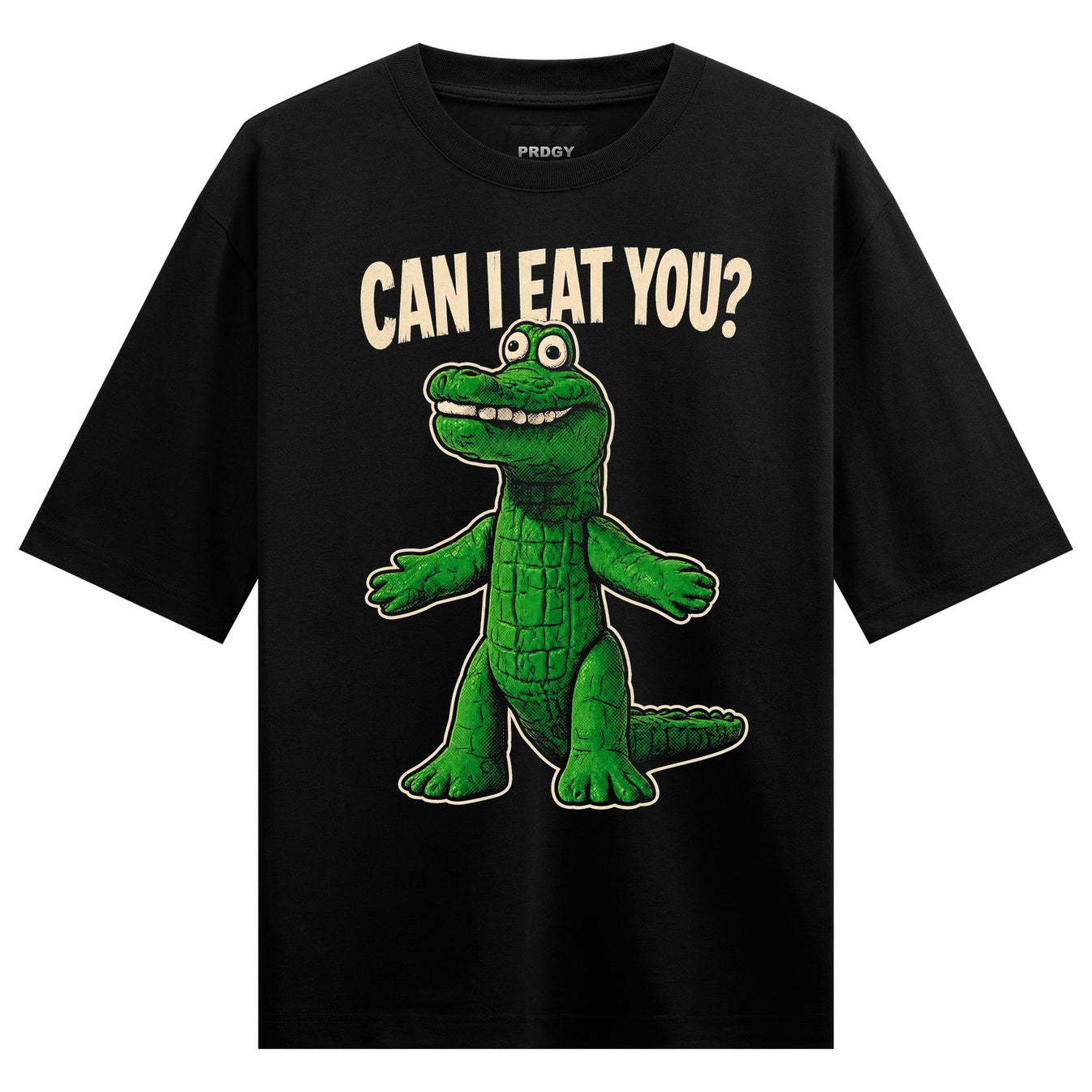 A green cartoon alligator with a wide smile and white teeth stands on a black t-shirt with the text CAN I EAT YOU above it...