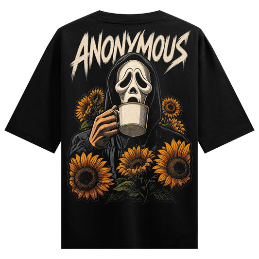 A black t-shirt back print features a ghost mask figure in a hoodie holding a coffee mug surrounded by bright orange and y...
