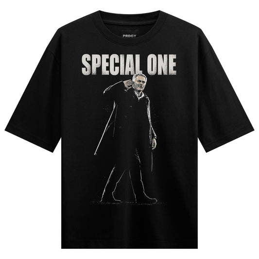 A black t-shirt features a monochrome portrait of a man in a trench coat with white text above and below on PRDGY oversize...