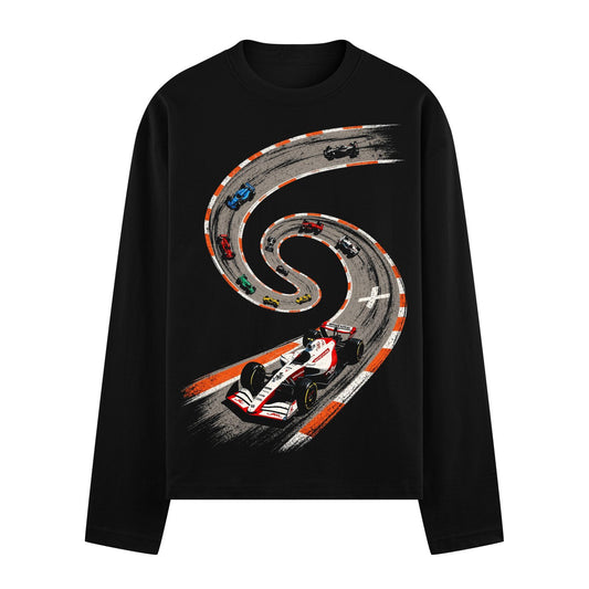 A white and red Formula 1 car races on a grey track with orange and white striped borders forming a spiral shape on PRDGY...