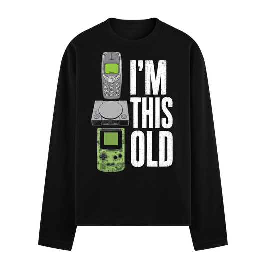 Black t-shirt with stacked vintage Nokia phone Game Boy and white distressed text reading I M THIS OLD with green screen o...