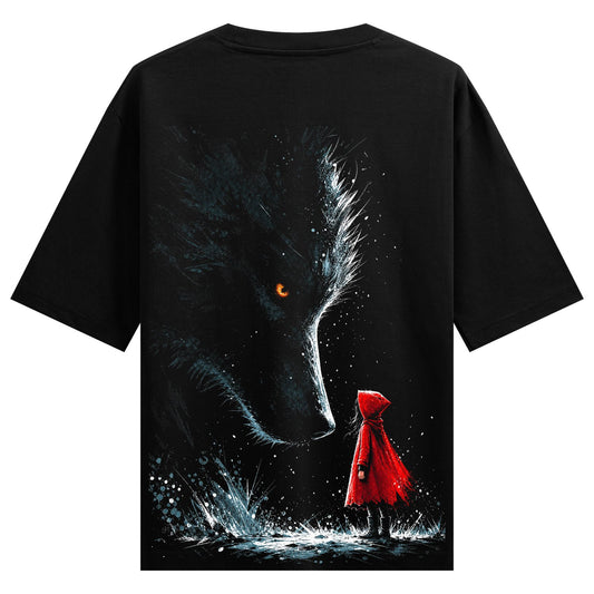 A large dark wolf with glowing orange eyes faces a small figure wearing a red hood set against a dark speckled background...