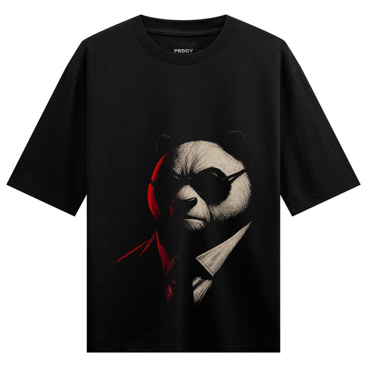 A black t-shirt features a close-up illustration of a panda wearing black sunglasses and a suit with dramatic red and whit...