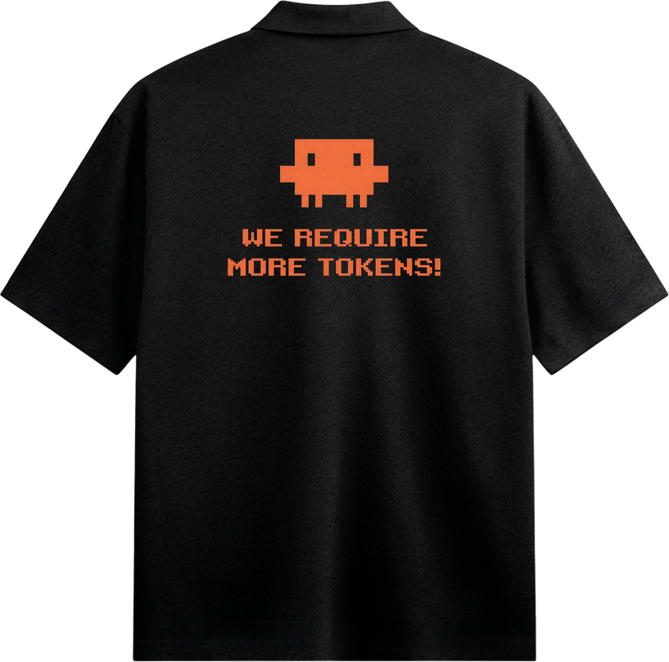 A black collared shirt with an orange pixelated alien graphic and pixelated text reading WE REQUIRE MORE TOKENS on the bac...