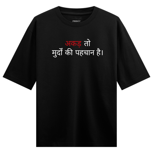 A black t-shirt features white text on the top and bold red and white Hindi text below conveying a strong message on PRDGY...