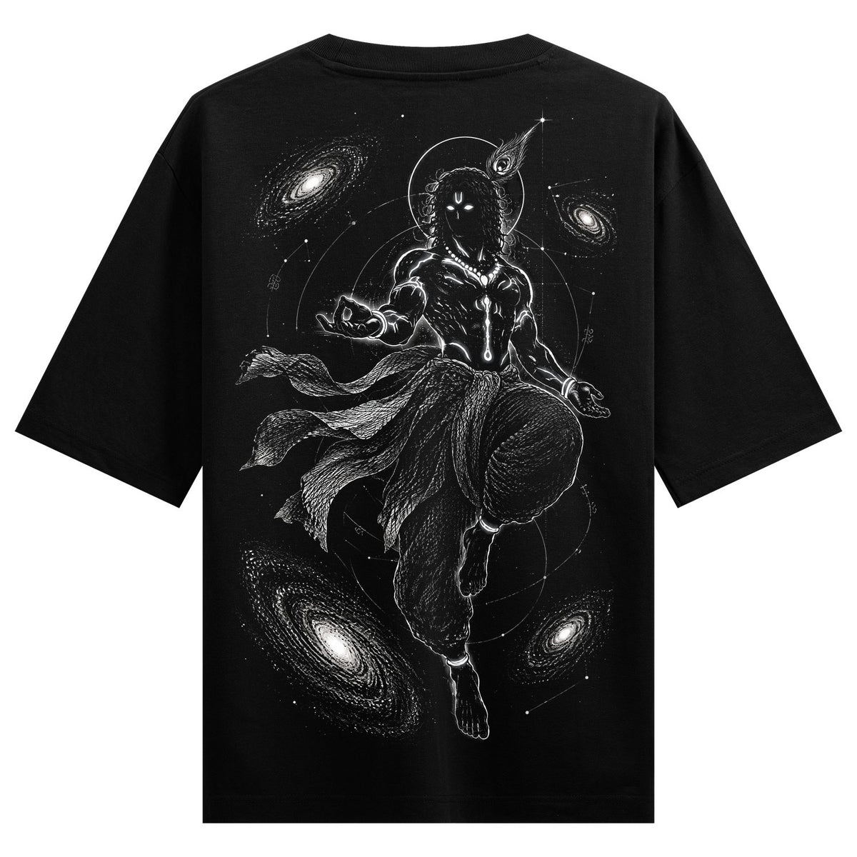 Cosmic Krishna Oversized T-Shirt — a black t-shirt features a white illustration of Krishna in a dynamic pose surrounded