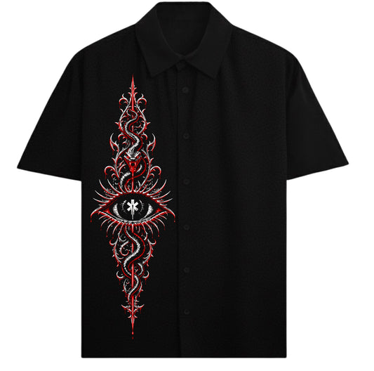 A black collared shirt features a vertical ornate design of an all-seeing eye with a red snake coiled around it and a star...