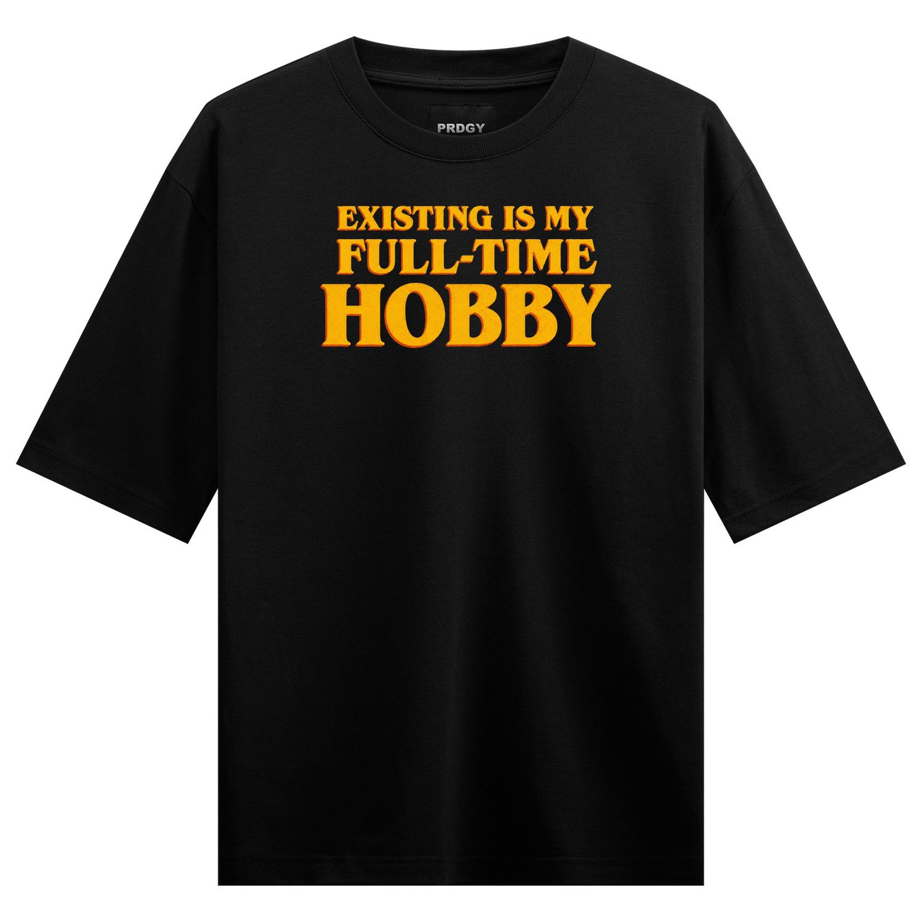 Bold orange text on a black t-shirt reads EXISTING IS MY FULL-TIME HOBBY with a smaller PRDGY above on PRDGY oversized t-s...