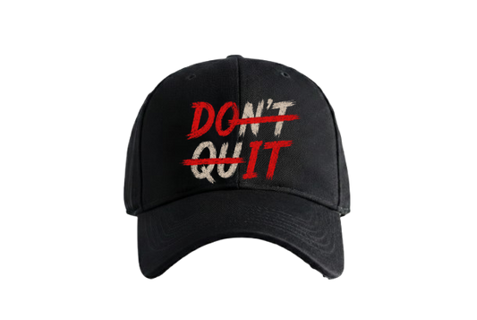 A black t-shirt features the words DON T and QUIT in a distressed white font with DON T crossed out by a red line on PRDGY...