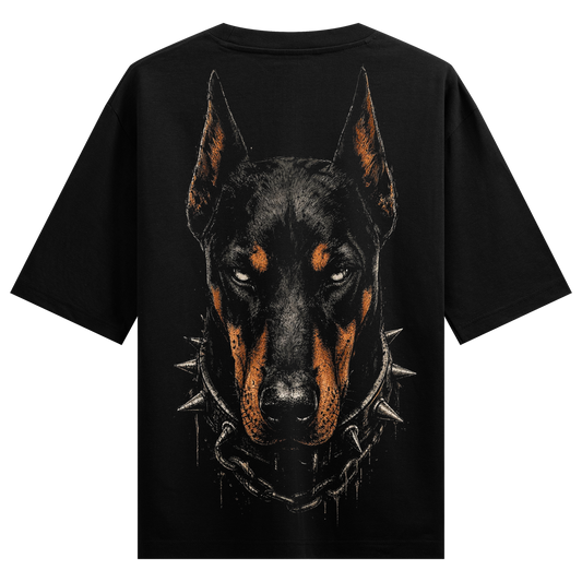 Guardian Beast T-Shirt by PRDGY — Intense Doberman portrait with spiked collar, dark art design.