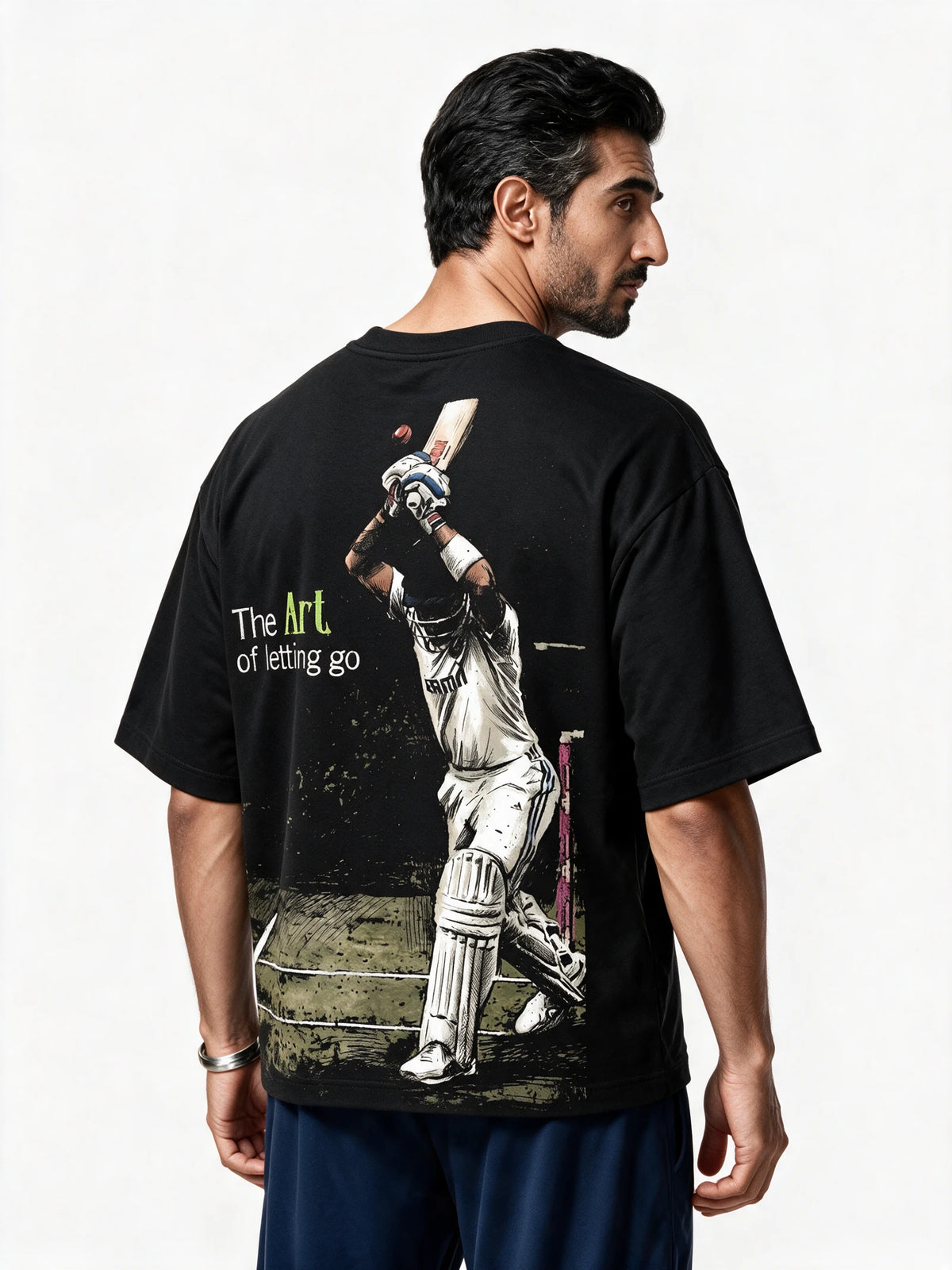 Chodh De Oversized T-shirt — back-print T-shirt at three-quarter angle