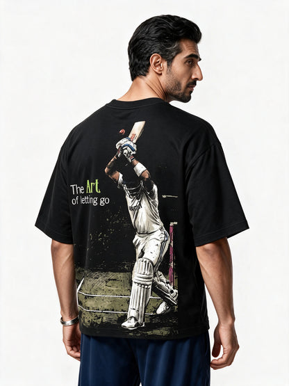 Chodh De Oversized T-shirt — back-print T-shirt at three-quarter angle