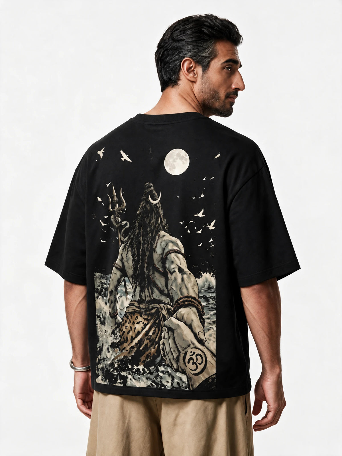 PRDGY Divine's Grip Oversized T-shirt — back-print T-shirt at three-quarter angle