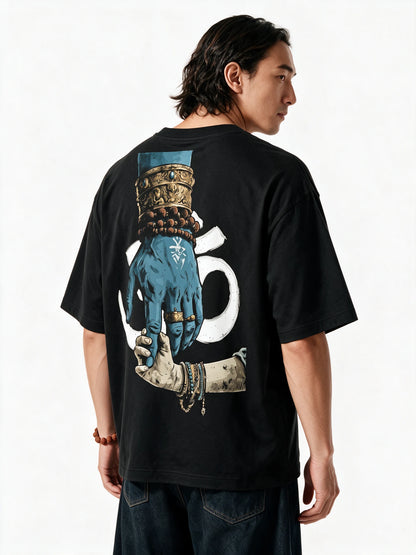 PRDGY Hold the Divine Oversized T-shirt — back-print T-shirt at three-quarter angle