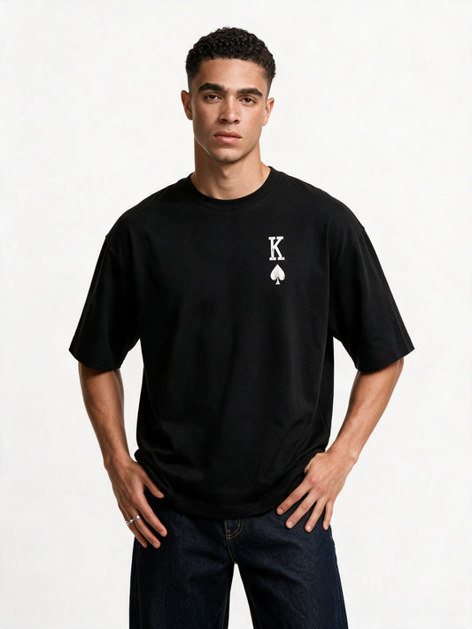 PRDGY King of Spades Oversized T-Shirt — front-print T-shirt on model