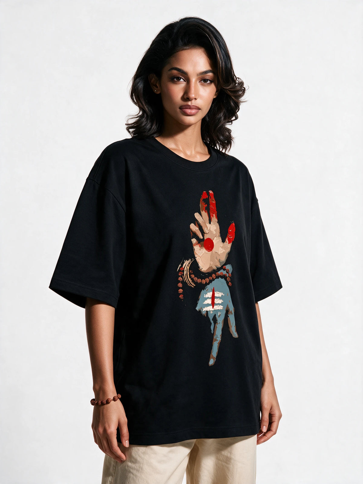 Nataraj Mudra Oversized T-Shirt — front-print T-shirt at three-quarter angle