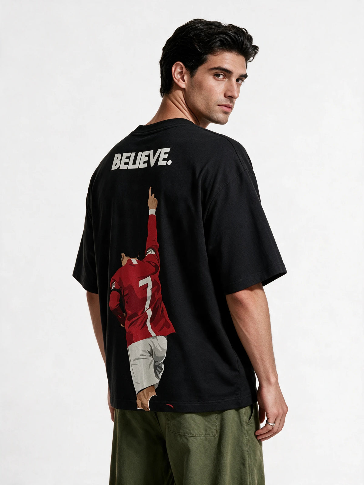 PRDGY Ronaldo Believed Oversized T-Shirt — back-print T-shirt at three-quarter angle