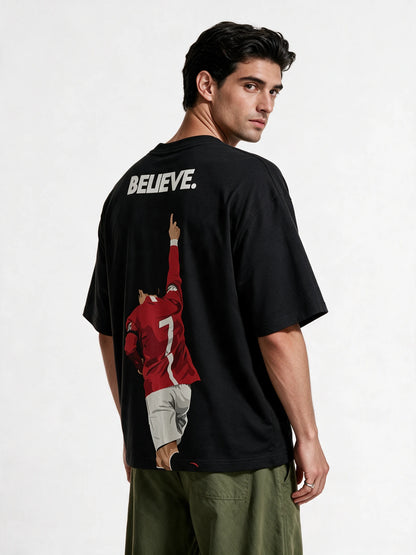PRDGY Ronaldo Believed Oversized T-Shirt — back-print T-shirt at three-quarter angle