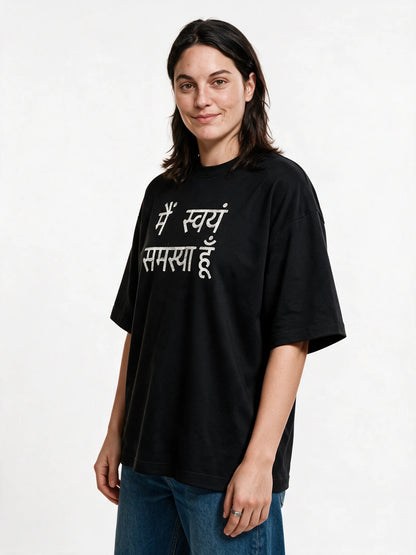 Self Problem Oversized T-shirt — front-print T-shirt at three-quarter angle