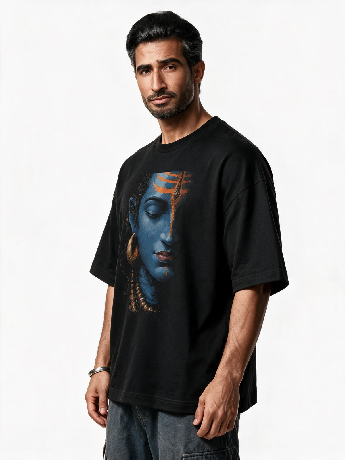 PRDGY Shiva Divine Oversized T-shirt — front-print T-shirt at three-quarter angle