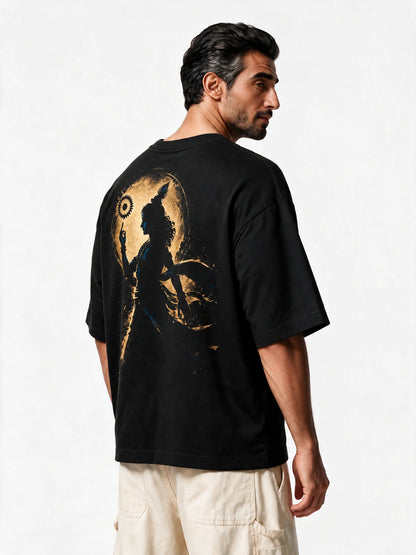 PRDGY Sudarshan Oversized T-Shirt — back-print T-shirt at three-quarter angle