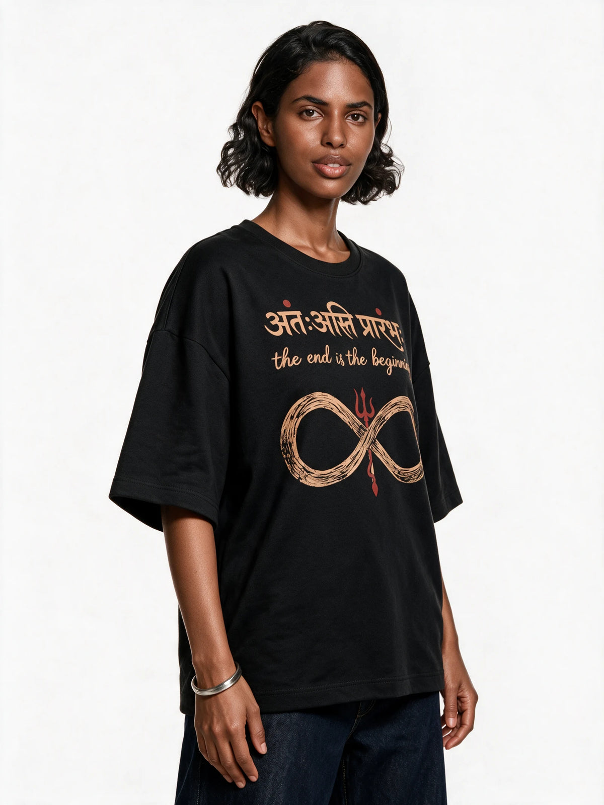 PRDGY The Endless Beginning Oversized T-Shirt — front-print T-shirt at three-quarter angle